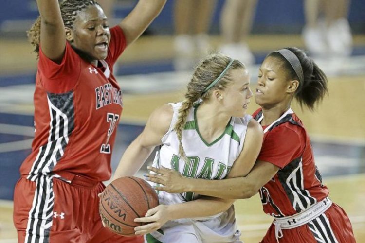 photo of girls playing baseketball