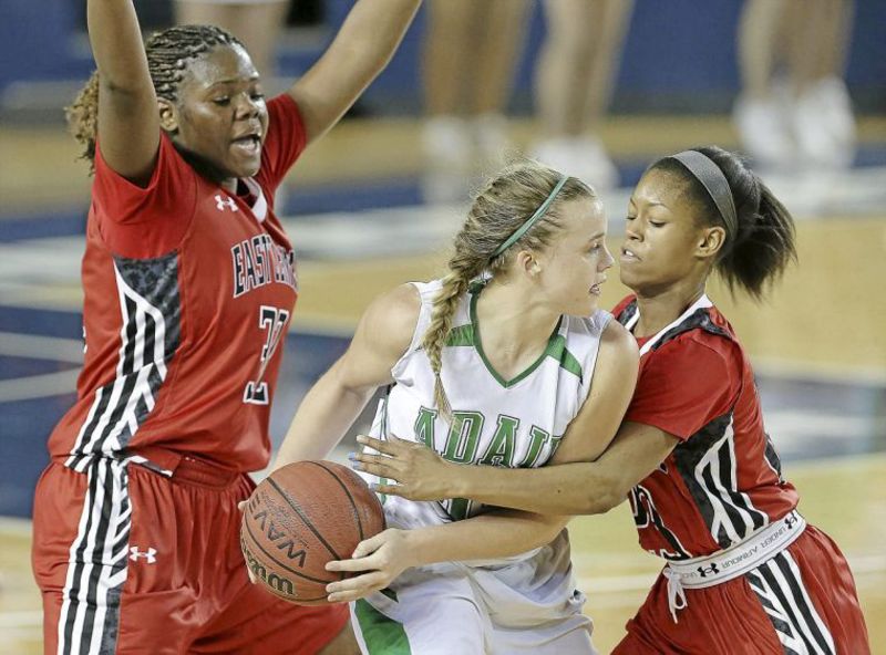 photo of girls playing baseketball