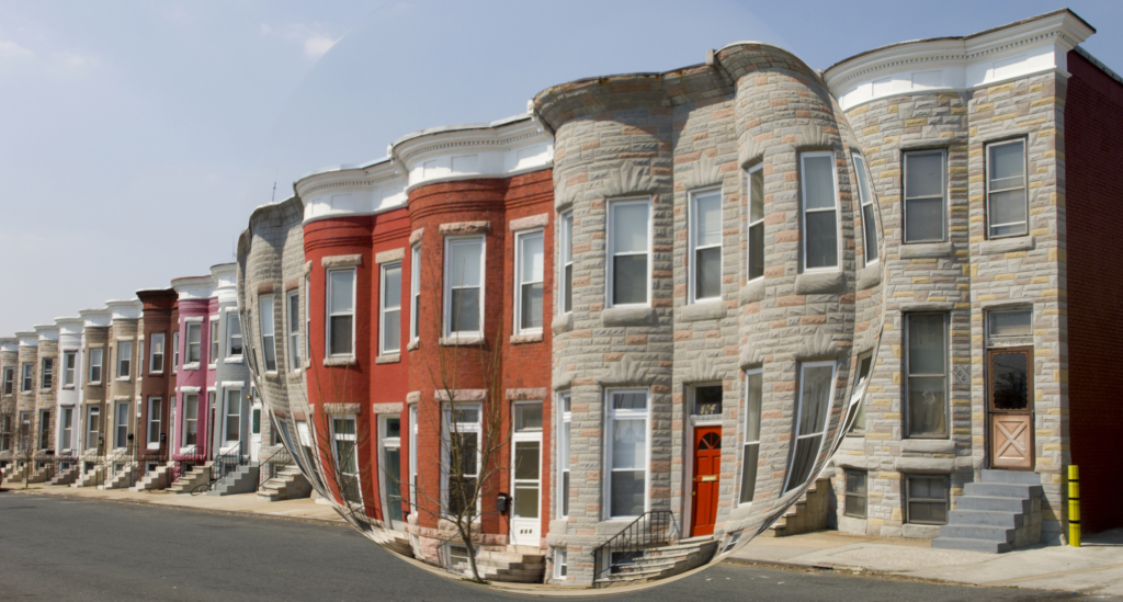 photo of row of townhouses seen through fisheye camera lens